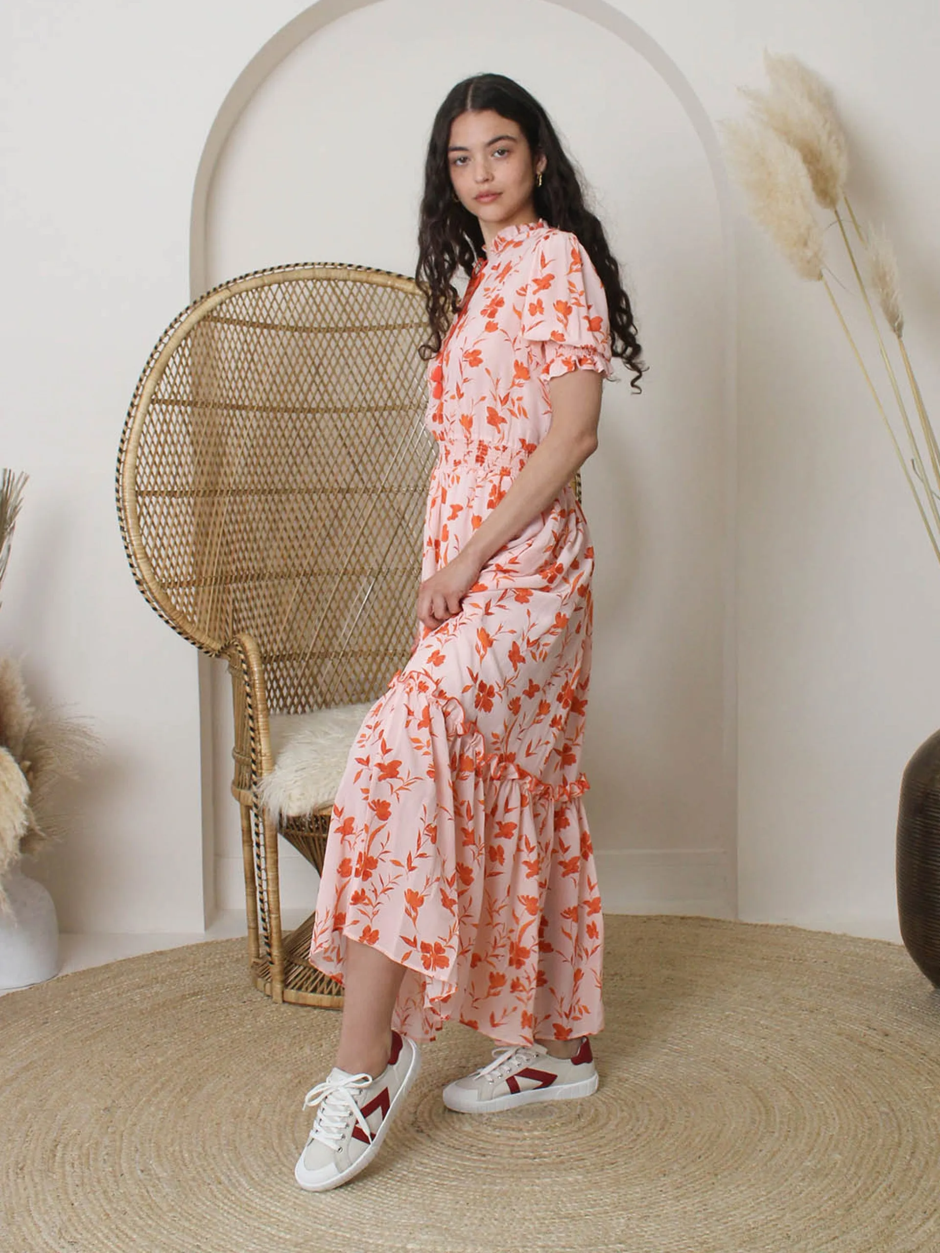 The Helios beige and red trainers