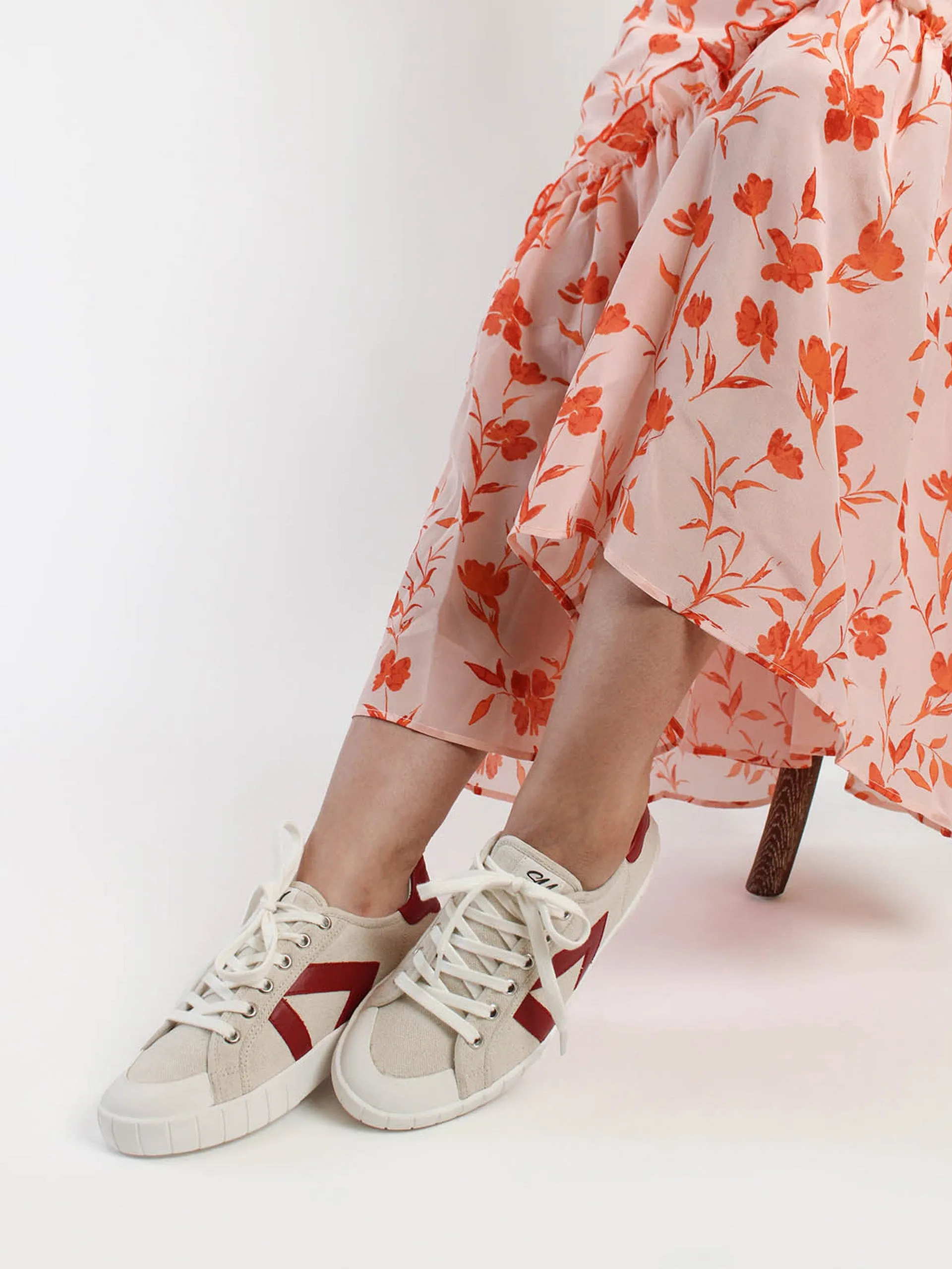 The Helios beige and red trainers